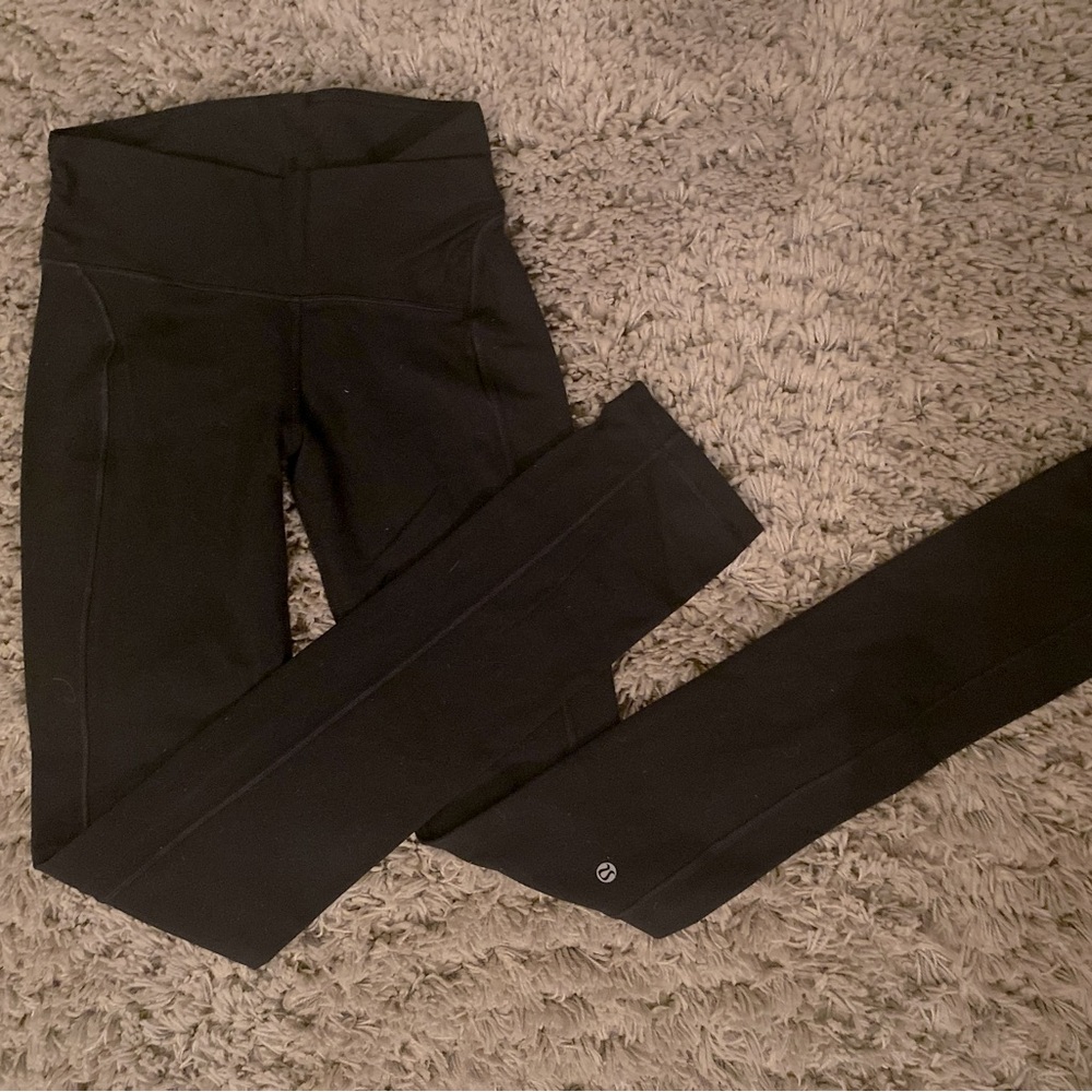 Lululemon black straight leg leggings, size 4